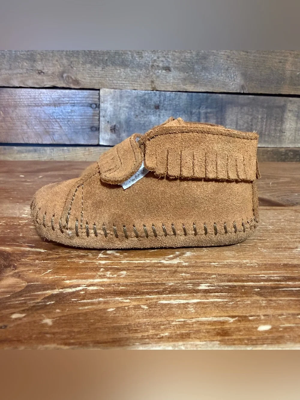 Minnetonka Moccasins Infants Front Strap Bootie, Brown, Size 3